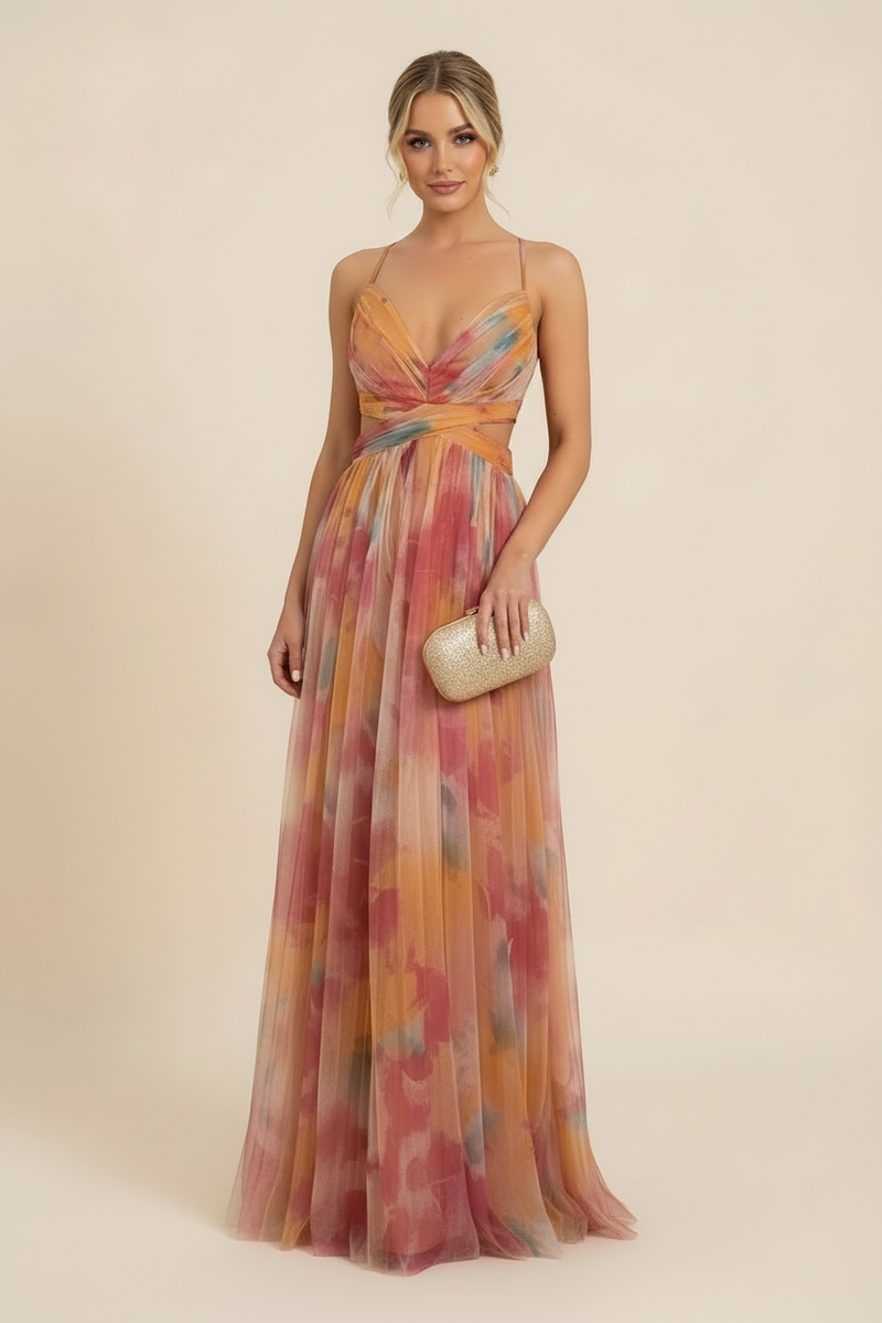 Addison Watercolor Maxi Dress featuring a pleated skirt and fitted bodice, in soft watercolor print with gold clutch.
