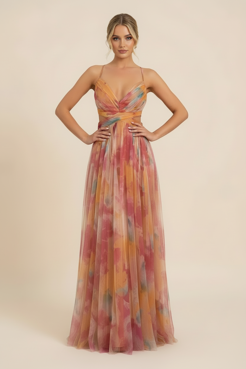 Addison Watercolor Maxi Dress with hands on hips, emphasizing the cinched waist and colorful watercolor print on the dress.