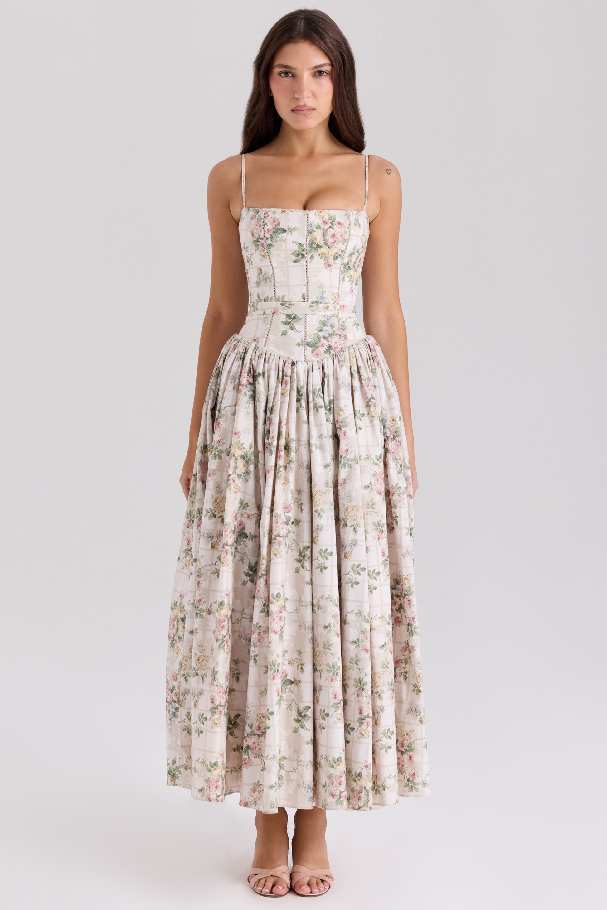 Front view of the Adeline Corset Midi Dress in an off-white floral pattern with pink and green accents, featuring a corset bodice.