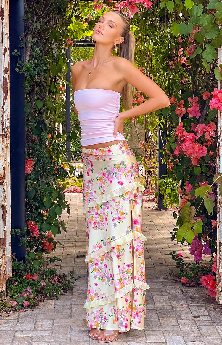Yellow floral ruffled maxi set with strapless tied crop top and high-slit for women