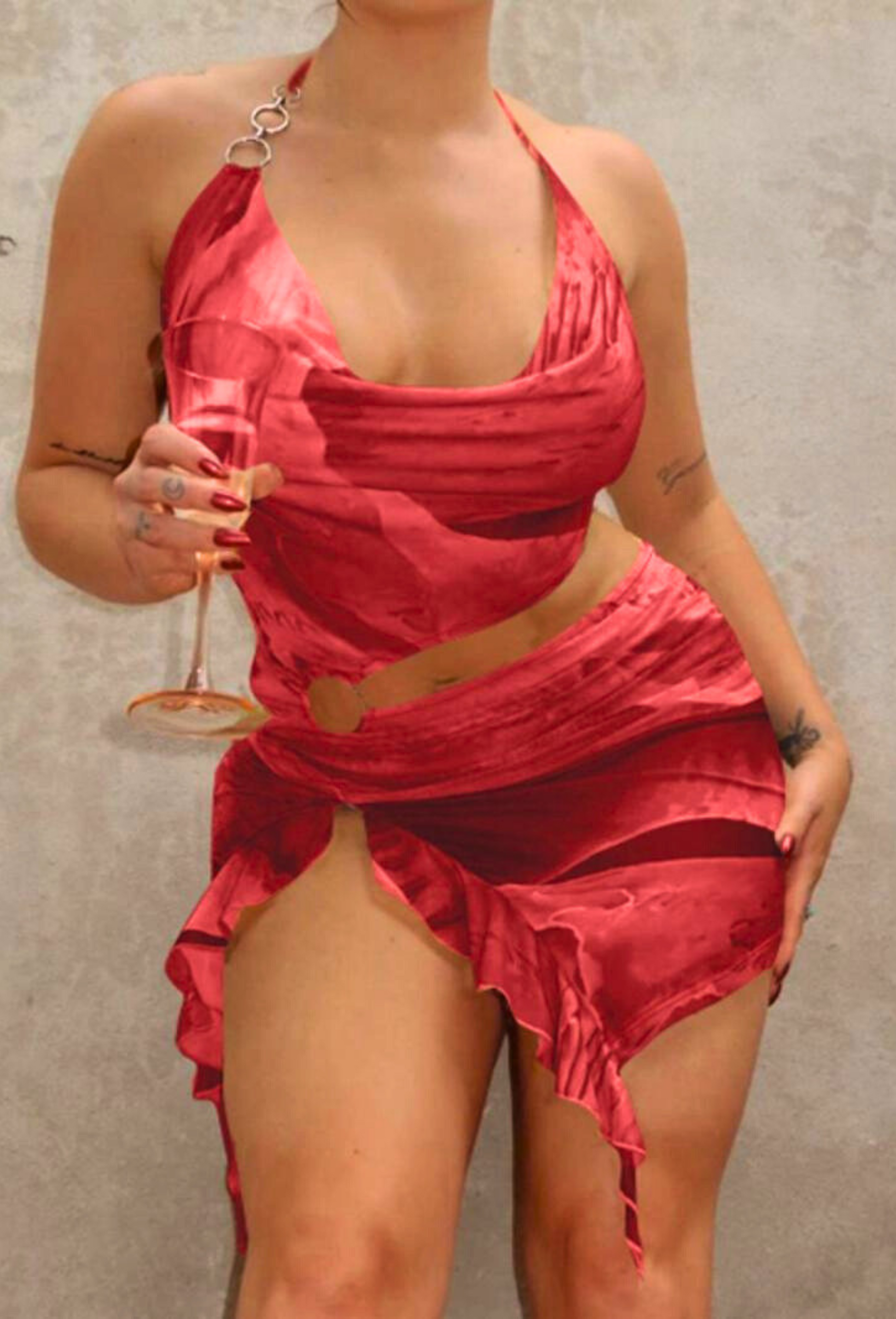 Alexandra Cutout Mini Dress in a rich red color, with a draped cowl neckline, midriff cutout, and asymmetrical ruffled hem.