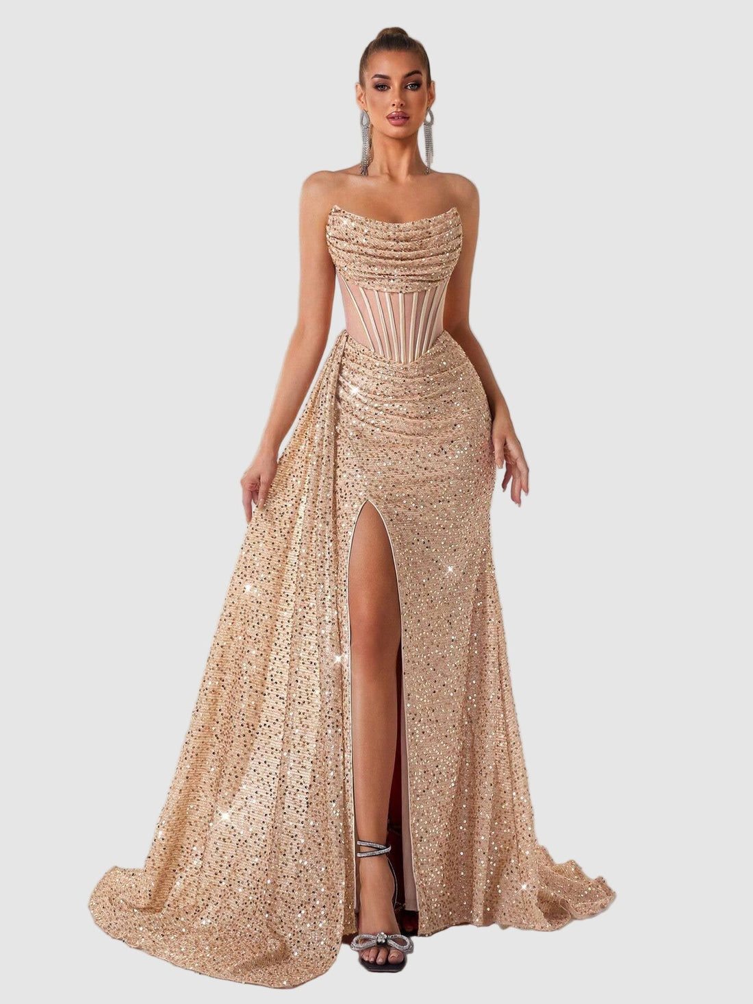 Black sequin maxi dress with strapless sweetheart neckline, sheer corset bodice, high leg slit, and flowing skirt with train.