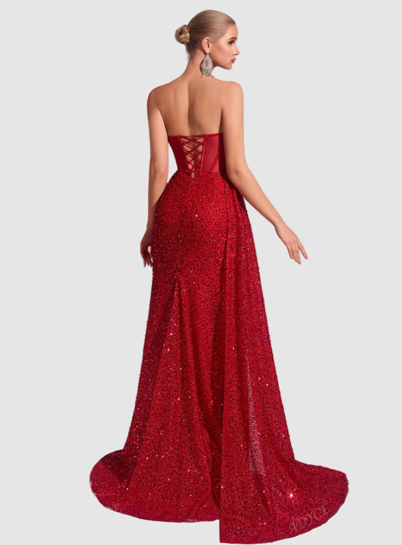 Back view of a red sequin maxi dress, showcasing the lace-up corset detail and the elegant train of the skirt.