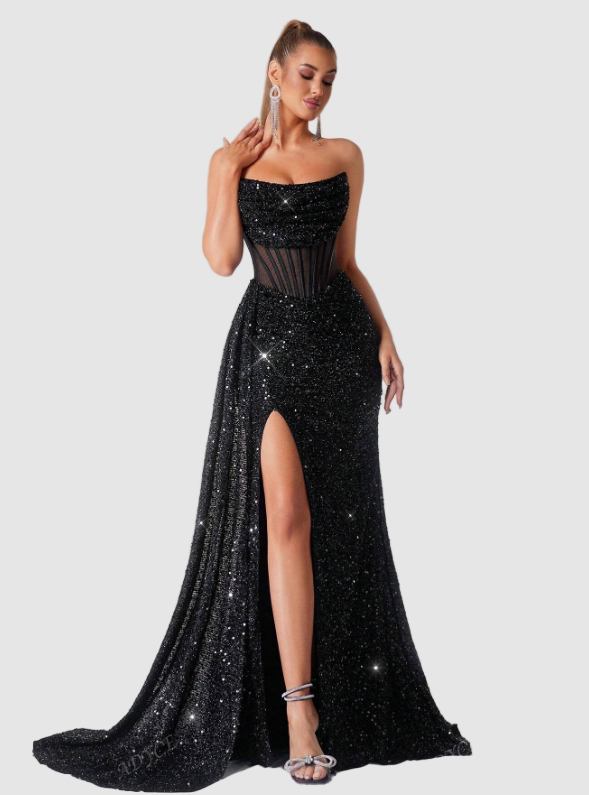 Black sequin maxi dress with strapless sweetheart neckline, sheer corset bodice, high leg slit, and flowing skirt with train.