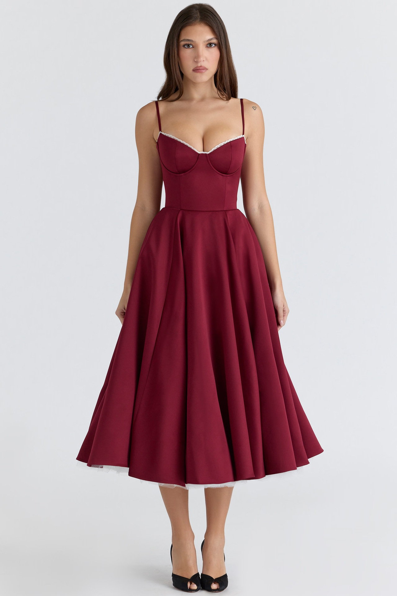 Front view of a rich burgundy Angela Corset Midi Dress with a full skirt and white lace trim along the sweetheart neckline.