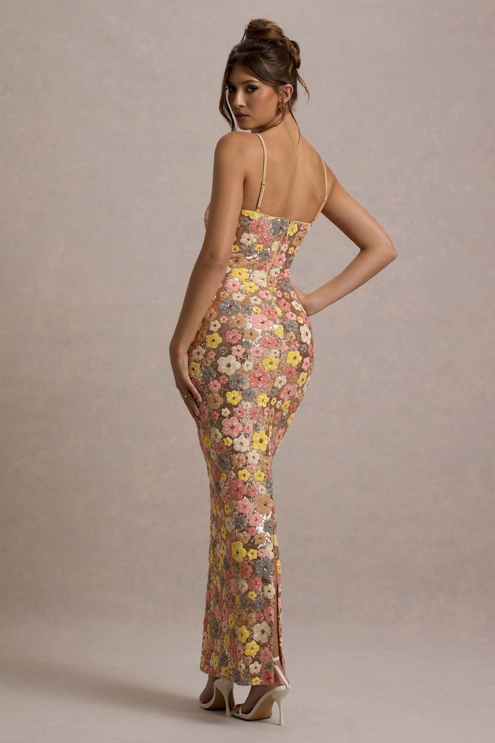 Women's floral sequin maxi dress, back view showing fitted silhouette and spaghetti straps