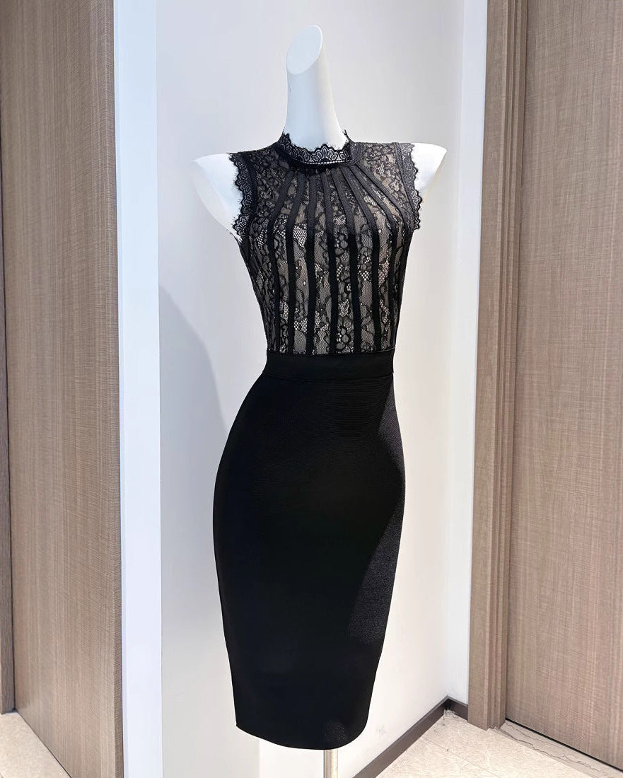 Mannequin wearing the black Cecily Lace Midi Dress, showcasing the high neck and knee-length design.