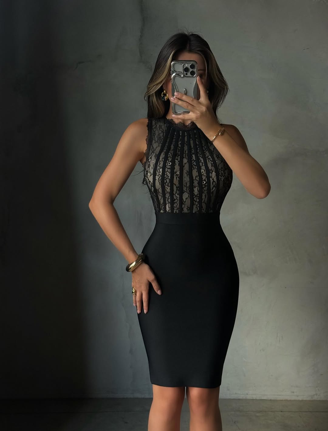 Black Cecily Lace Midi Dress with sheer lace bodice and solid black skirt, sleeveless design.
