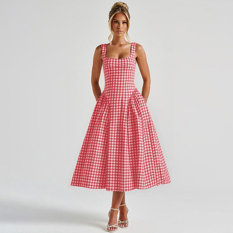Front view of a vibrant red gingham midi dress, showcasing a fitted top and a wide, pleated skirt, a stylish dress for women.