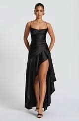 Front view of a black maxi dress with a sweetheart neckline, ruched details, and a ruffled high-low hem.