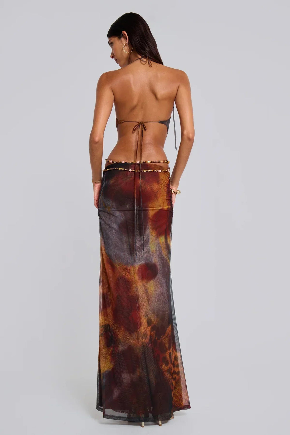 Brown and red abstract animal print maxi dress with deep v-neck and waist cutouts for women