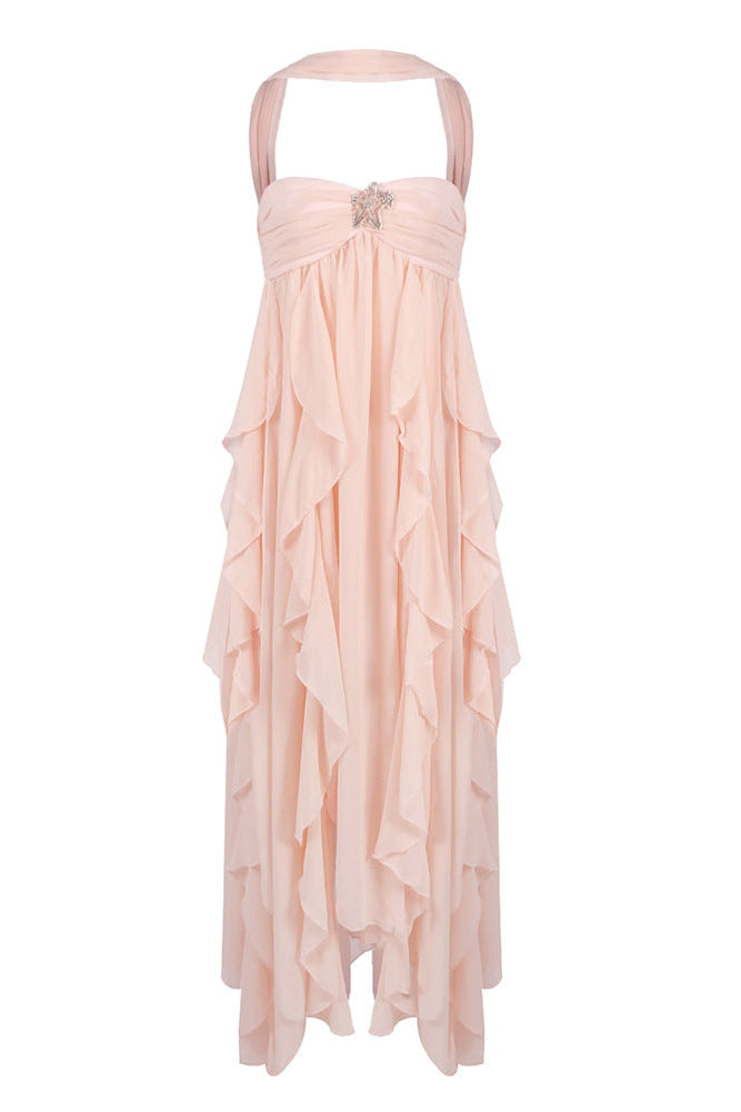 Front view of Elaina peach ruched maxi dress with halter neck and tiered ruffle skirt