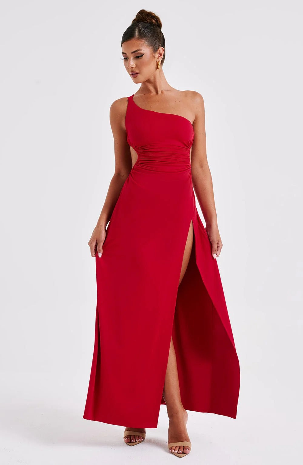 Red Elara Ruched Maxi Dress with a high slit, one-shoulder neckline, and ruched waist detail.