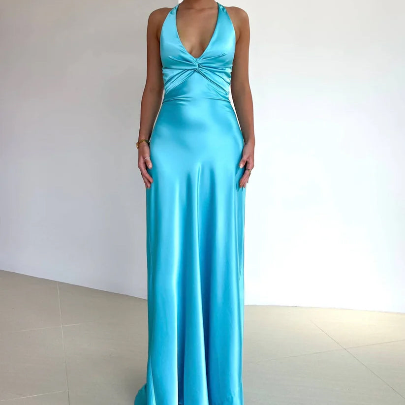 Front view of a light blue satin maxi dress with a halter neckline and a twisted bodice, showcasing the elegant drape.