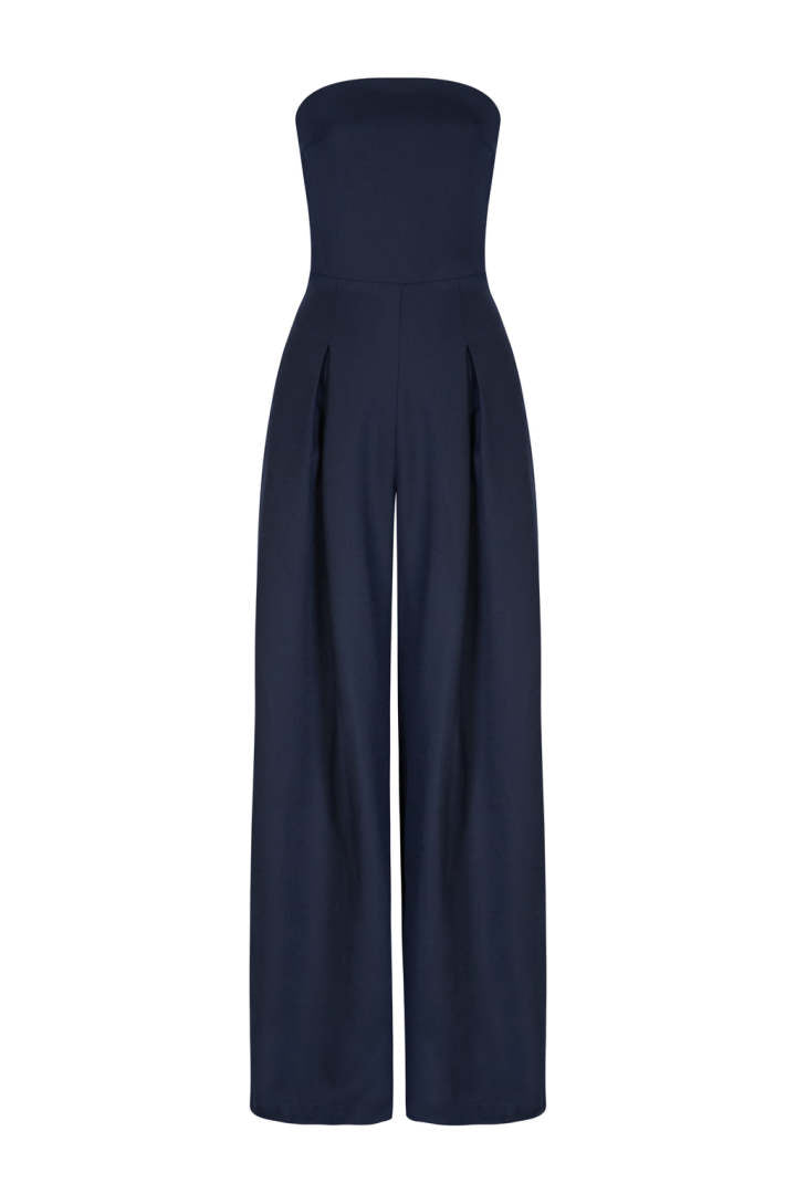 Flat lay of a navy blue strapless wide-leg jumpsuit, highlighting the structured bodice and wide pant legs.