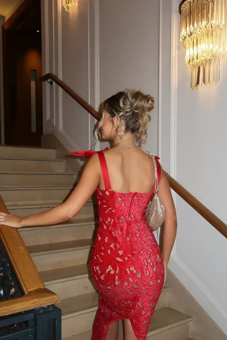 Back view of the red lace Elle Bow Maxi Dress, showing the fitted silhouette and shoulder bow details.