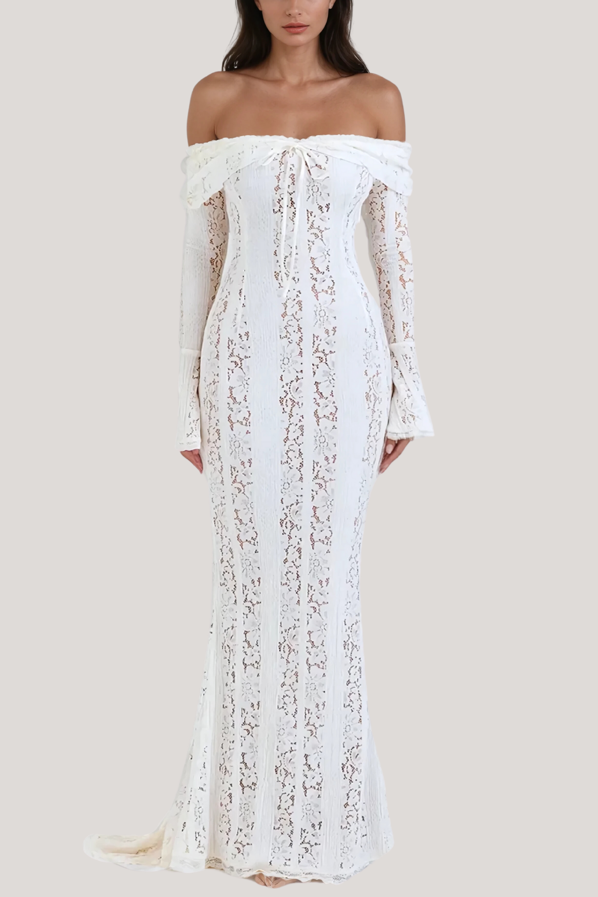 Front view of a white lace maxi dress, showcasing the off-the-shoulder ruffled top and long, flowing bell sleeves.