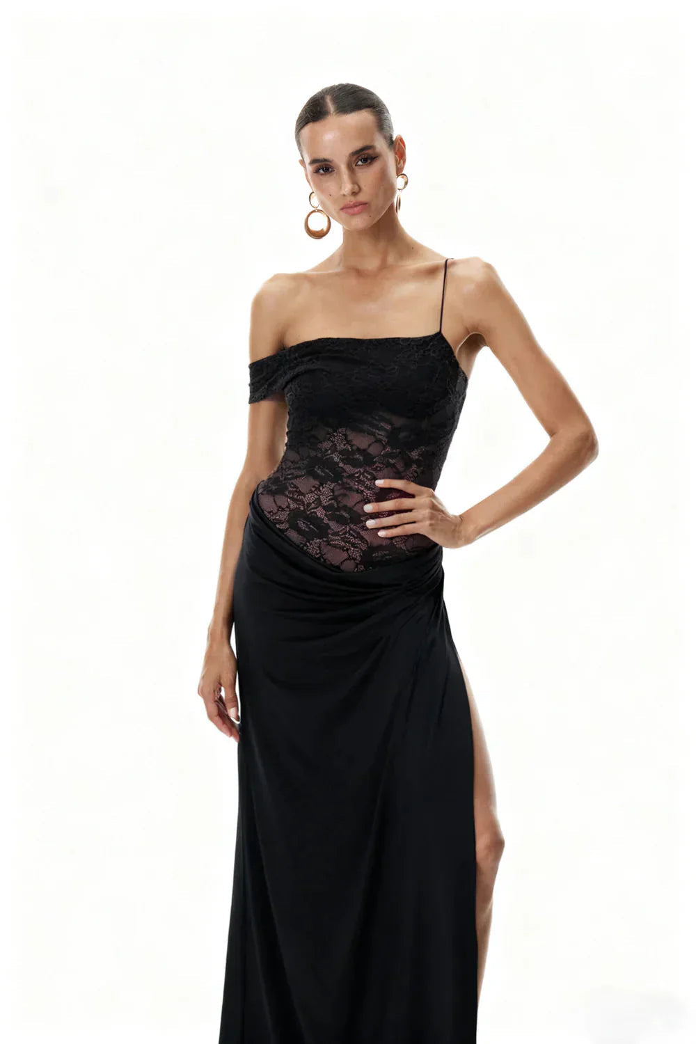 Front view of the black Emmalyn Lace Maxi Dress, highlighting the lace detailing on the bodice and the elegant silhouette.