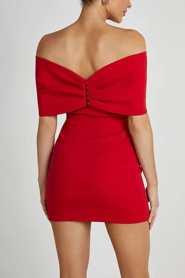 Back view of the red Freya Bow Mini Dress, featuring button detailing on the off-the-shoulder bow.