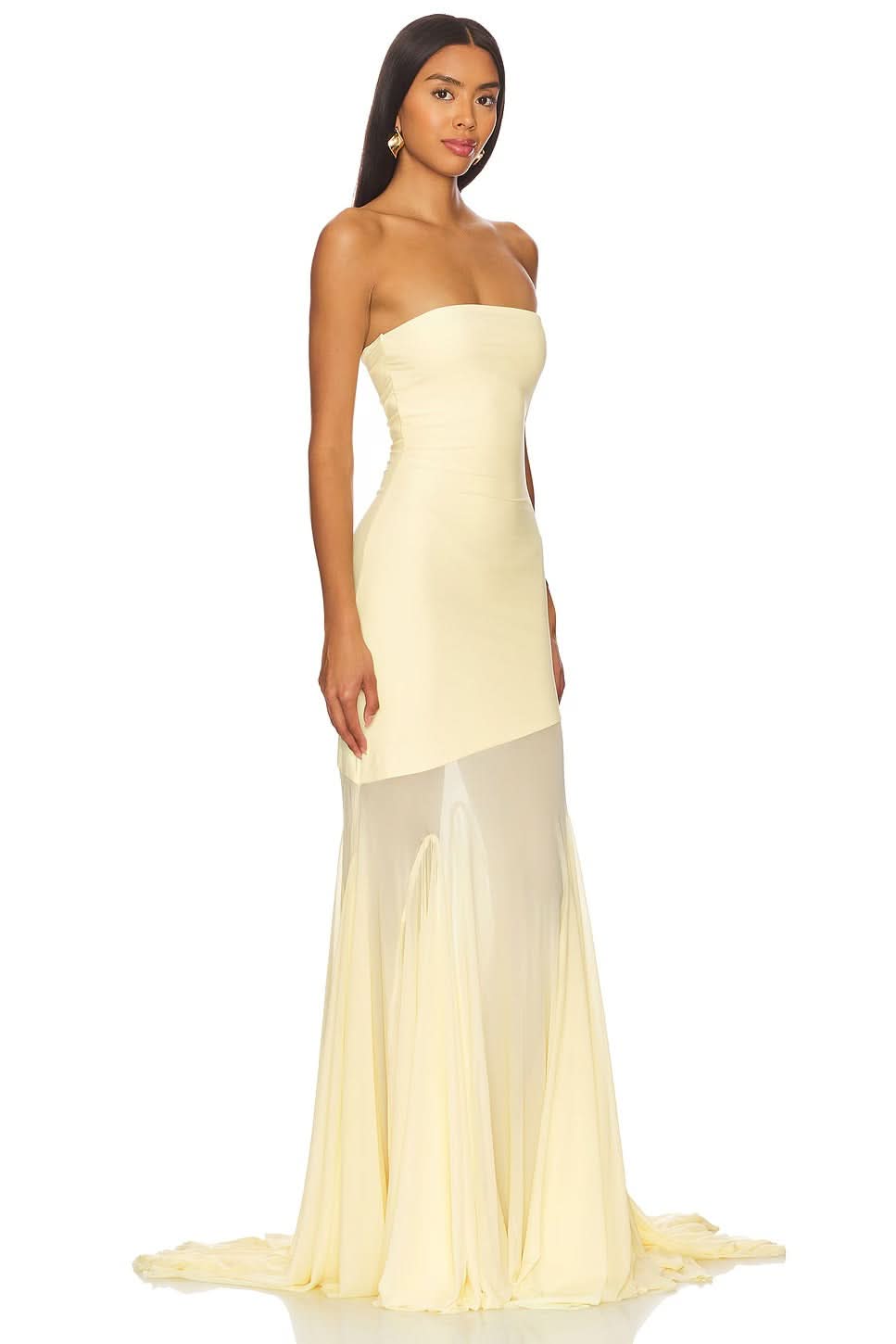 Elegant strapless Giana Mesh Maxi Dress in light yellow with sheer pleated skirt detail and long train.