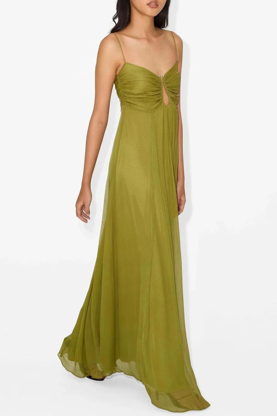 Side view of olive green maxi dress showing the flowing skirt and ruched keyhole bust, with thin shoulder straps.