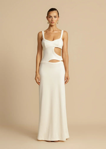 Full-length white Haisley cutout maxi dress with thick straps and side cutouts, on a light background.