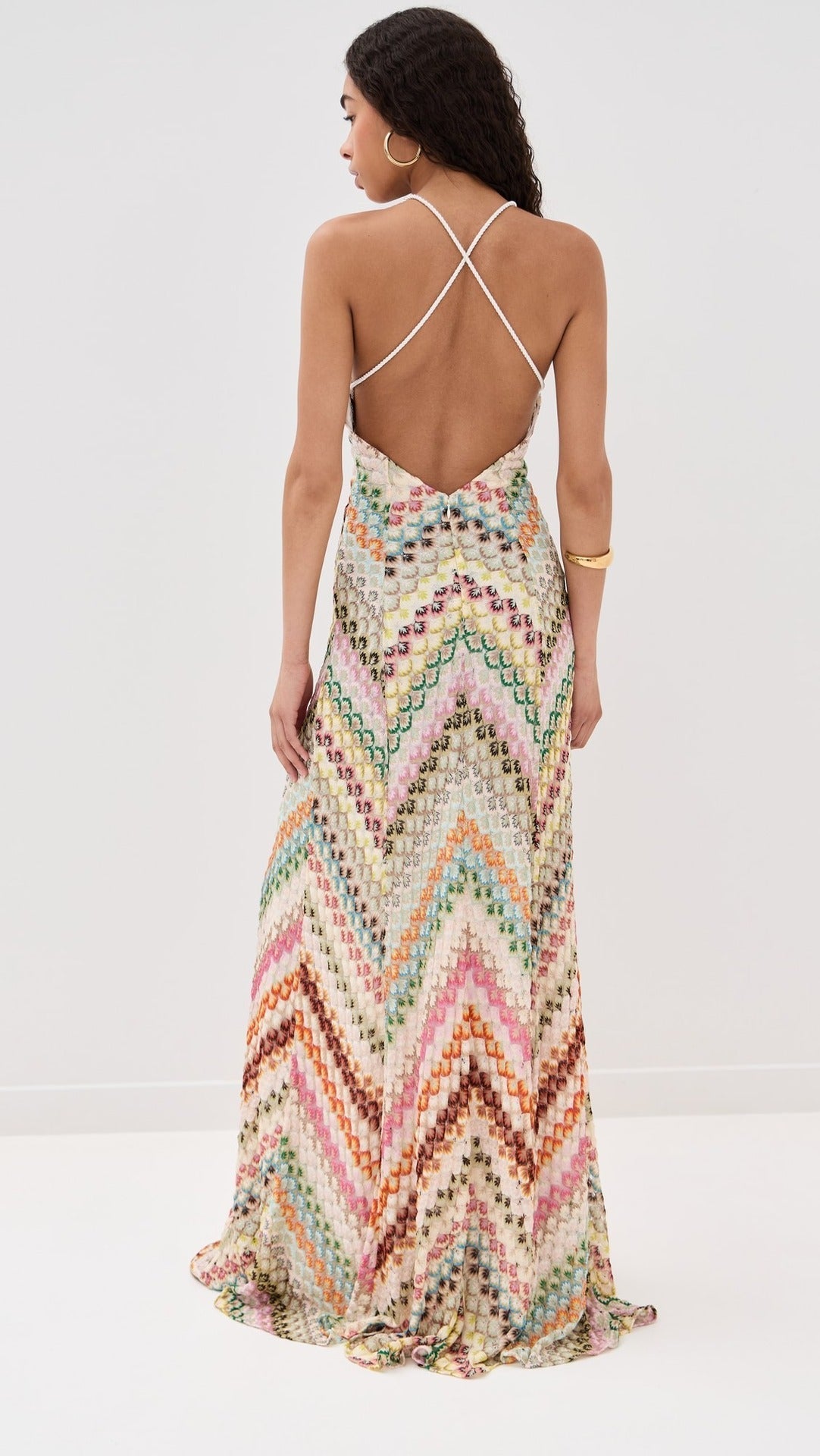 Front view of a multicolour chevron maxi dress with a deep V-neckline and spaghetti straps for women
