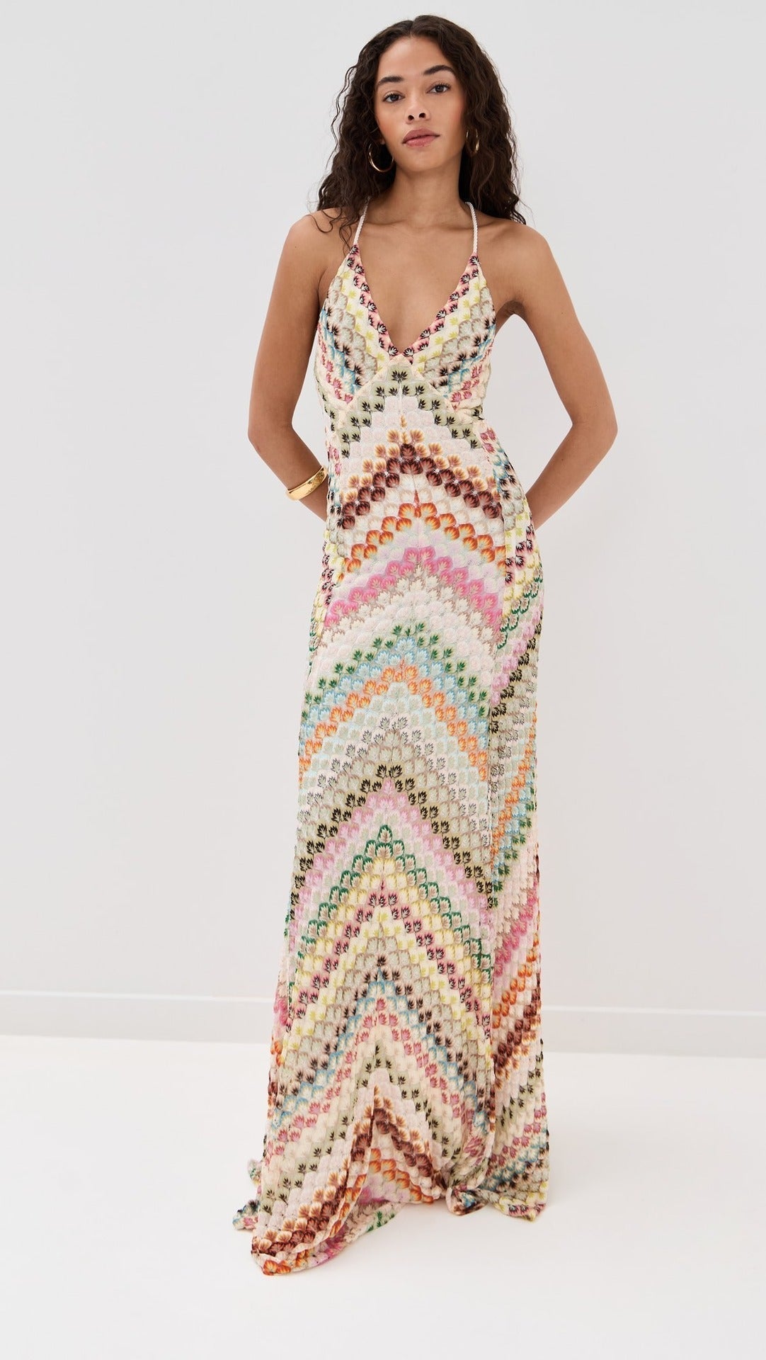 Front view of a multicolour chevron maxi dress with a deep V-neckline and spaghetti straps for women