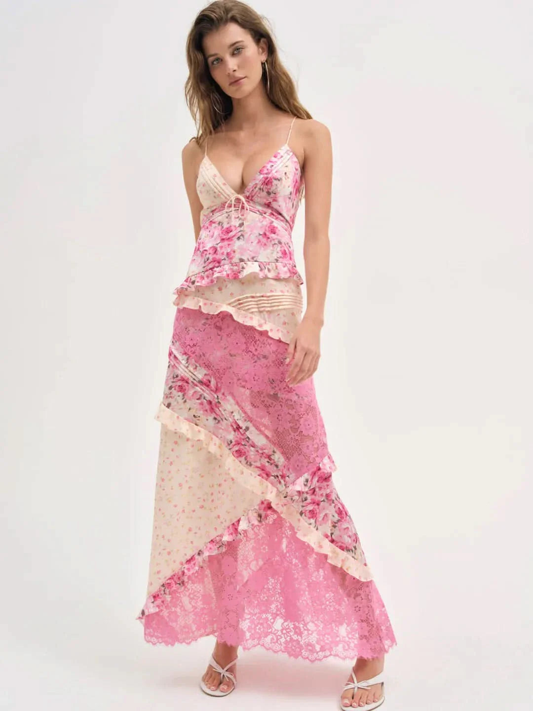 Front view of the Iris Tiered Maxi Dress in a rich pink floral and solid pink lace design, with a flattering v-neckline.