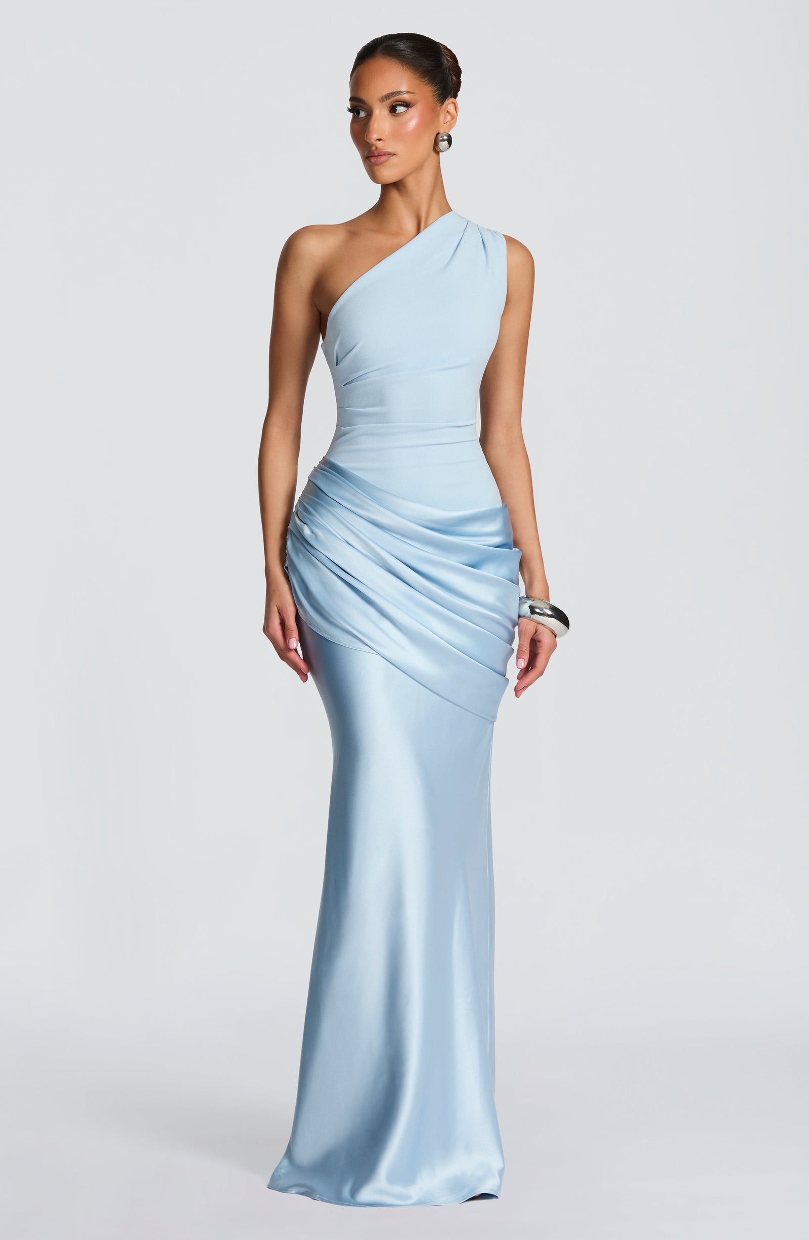Light blue Isabelle Draped Maxi Dress, a one-shoulder formal dress with a gracefully draped satin skirt, ideal for special occasions.