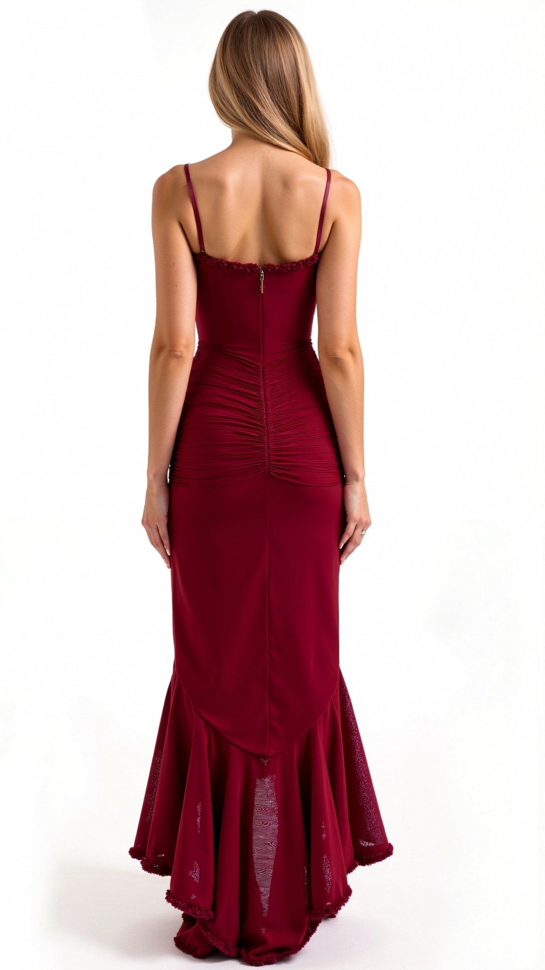 Back view of a woman wearing a deep red Isla Ruffle Maxi Dress, featuring a mermaid-style hem and subtle ruching.