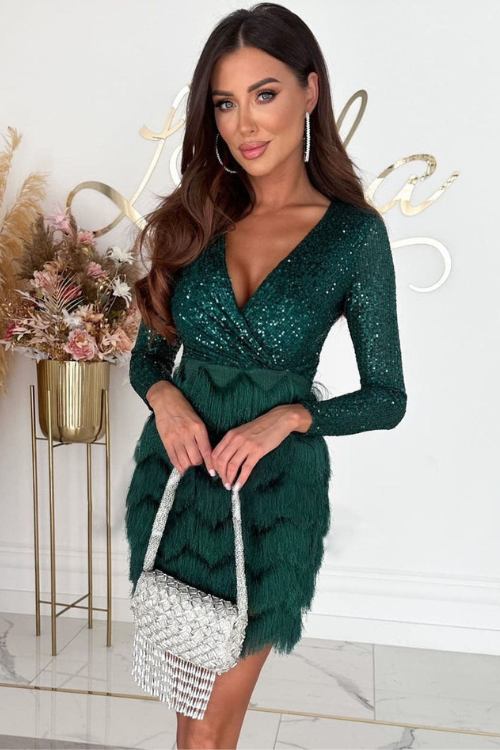 Jemma Fringe Mini Dress in emerald green, featuring a sequined long-sleeve top and a layered fringe skirt, paired with a silver beaded bag.