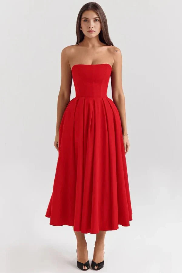 Vibrant red strapless midi dress with a tailored bodice and a full, pleated skirt.
