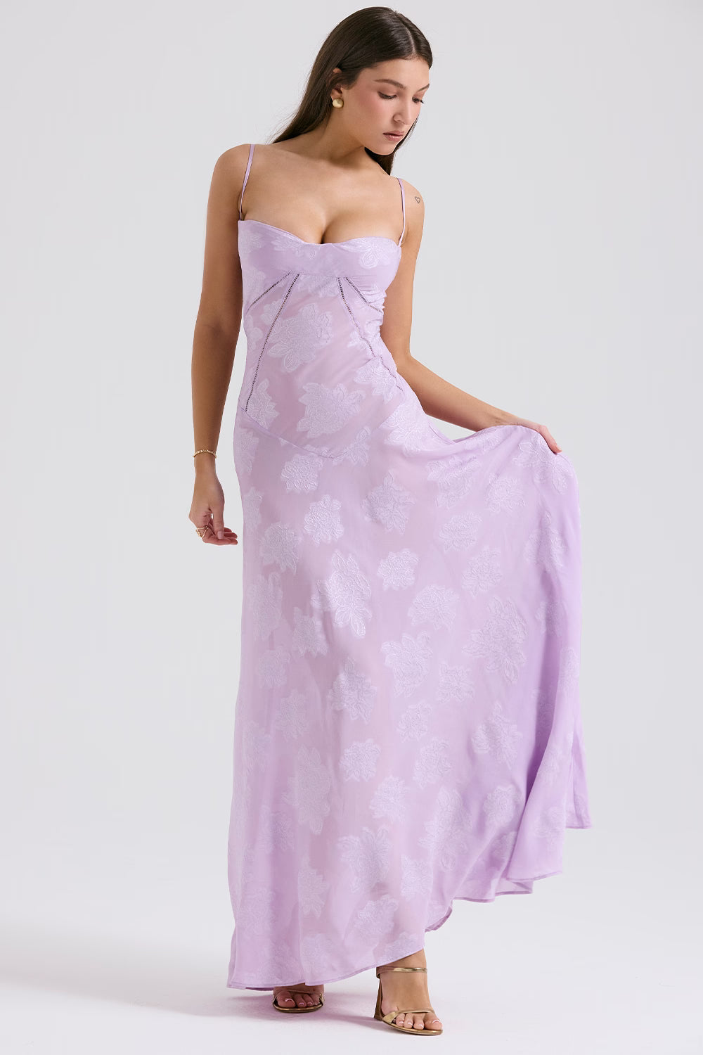 Front view of a light lavender Juliet Lace Maxi Dress with subtle floral patterns, sweetheart neckline, and thin straps.