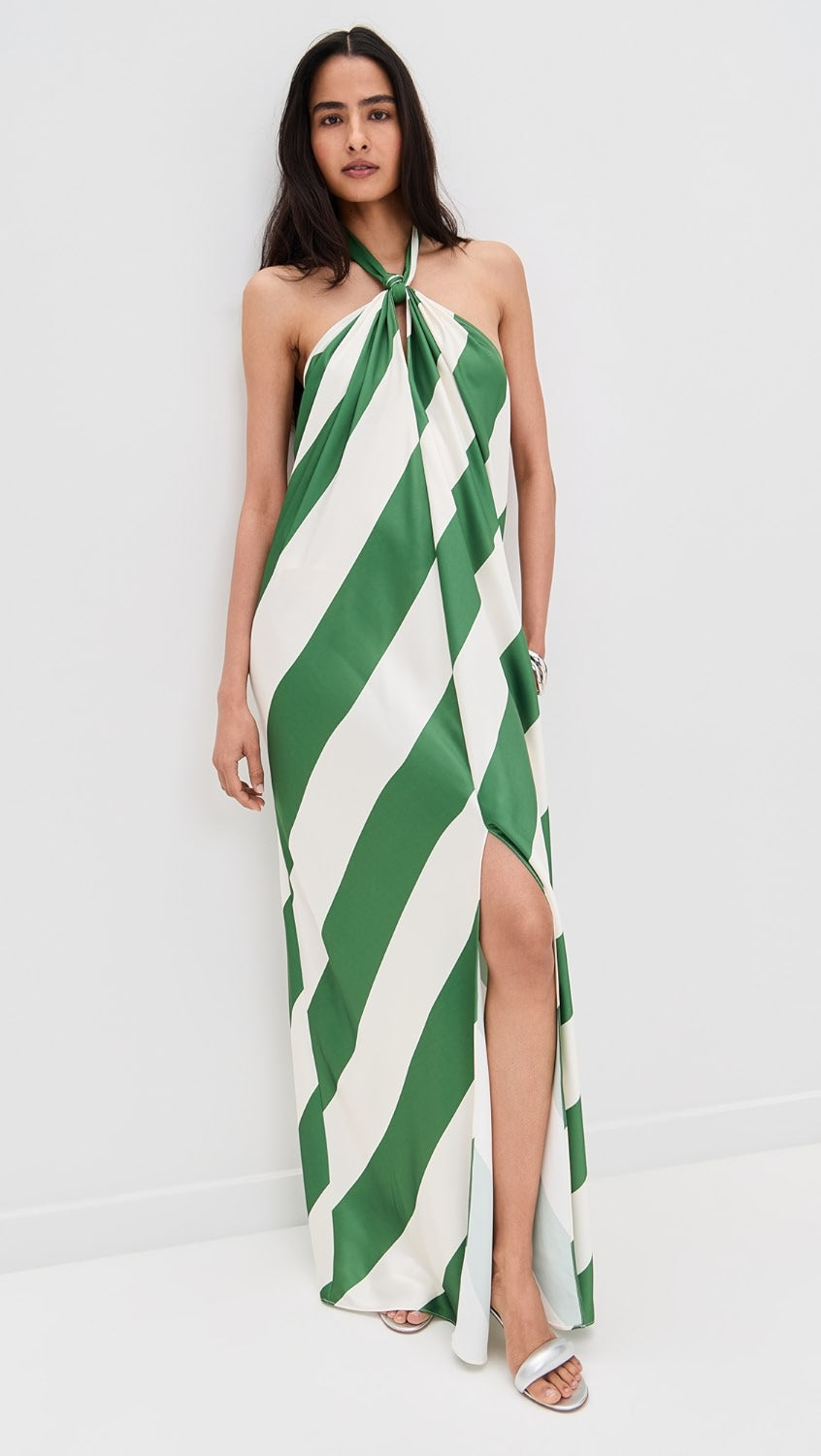 June Stripe Maxi Dress in green and white, full length, with a high slit, worn with silver flat slides.