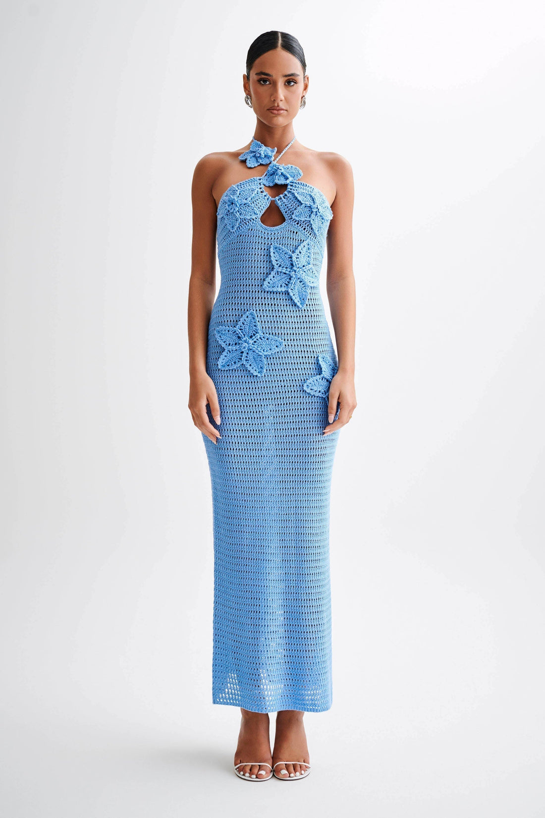 Front view of a yellow crochet maxi dress with floral appliques and a halter neckline, perfect for a wedding or summer event.