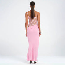 Back view of pink lace maxi dress with sheer floral lace bodice and draped skirt, spaghetti straps
