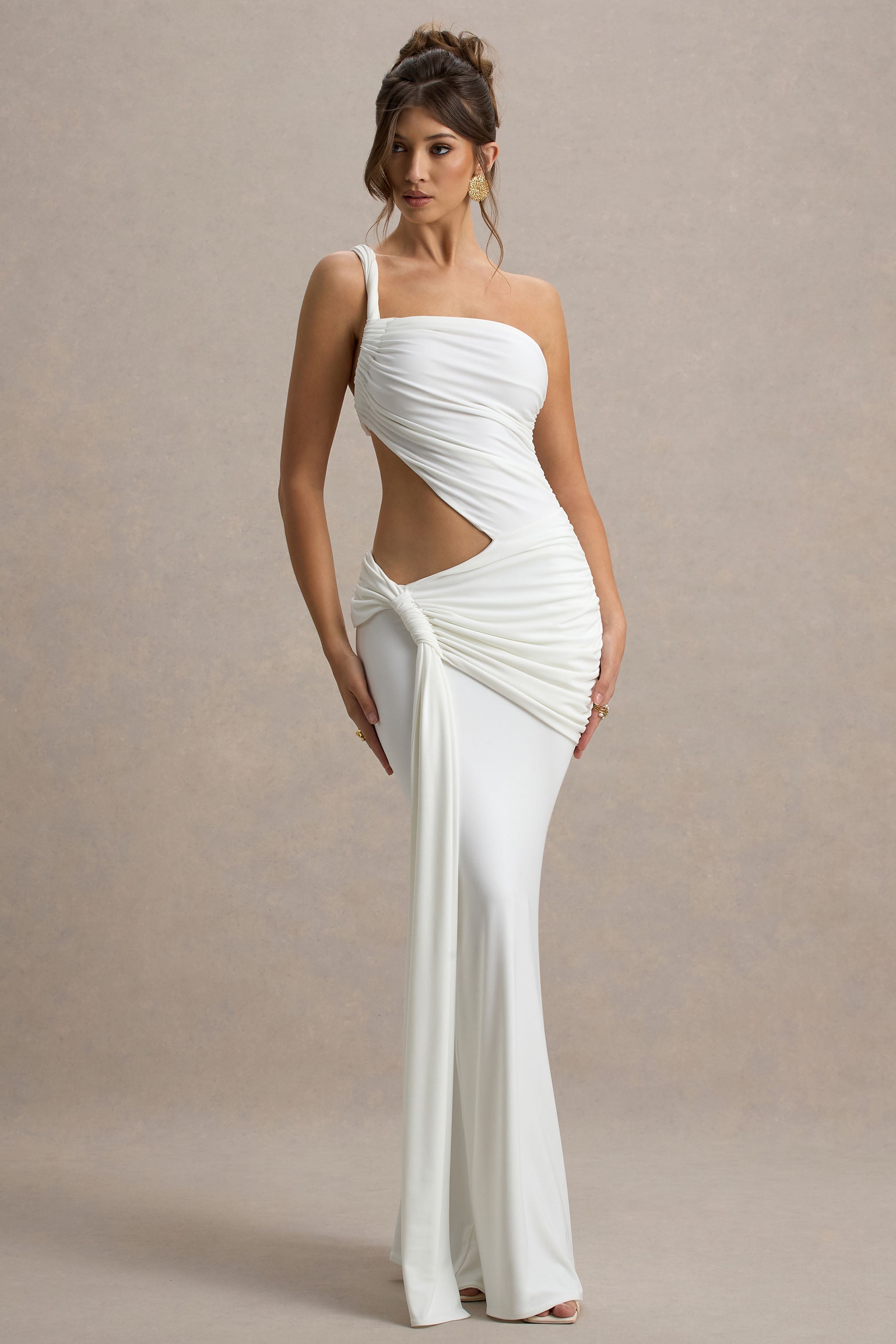 Elegant white Lorelei Cutout Maxi Dress with a single shoulder strap, side cutout, and a draped knot detail on the hip, full length.