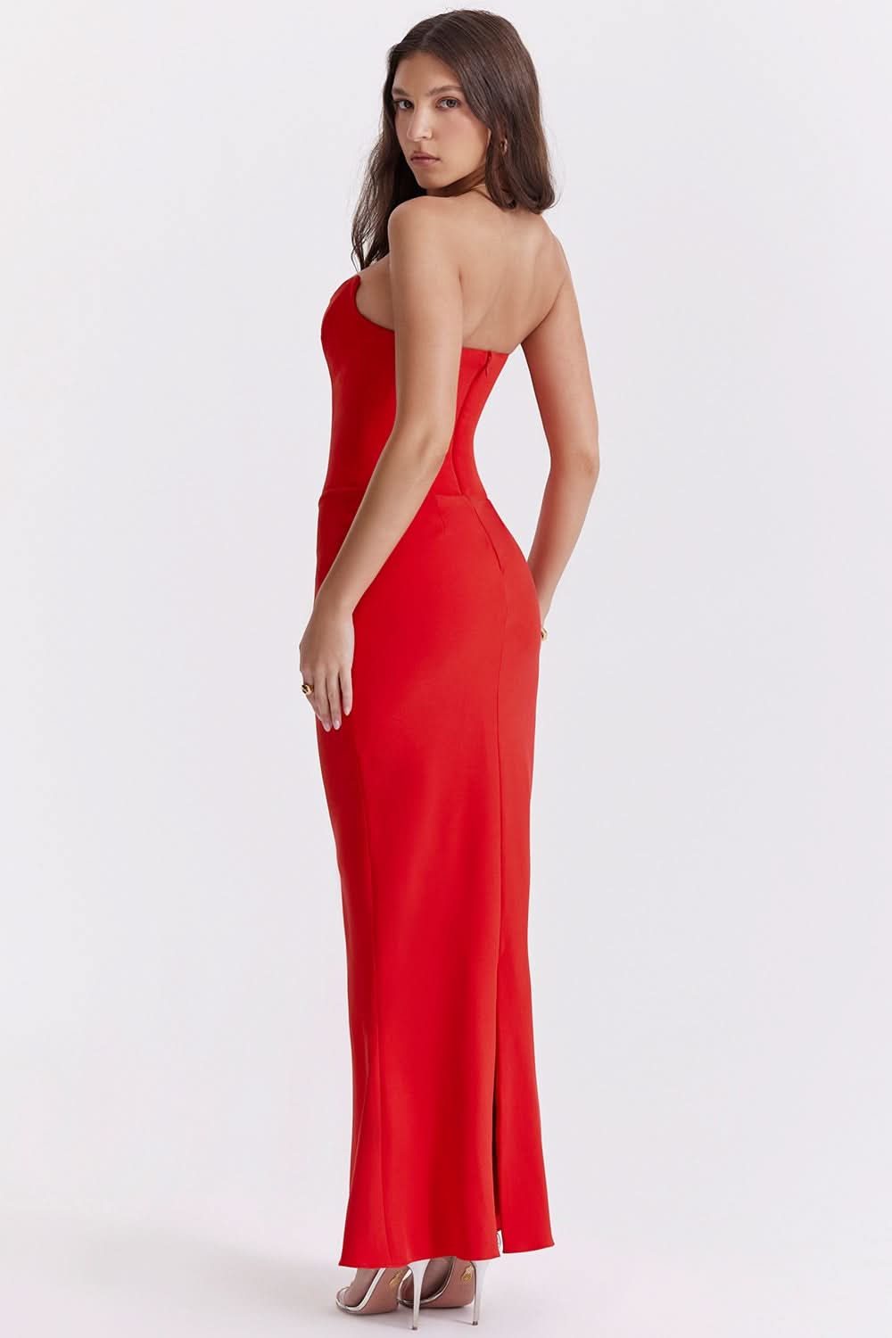 Front view of a striking red strapless corset maxi dress, featuring a sweetheart neckline and a long, sleek skirt.