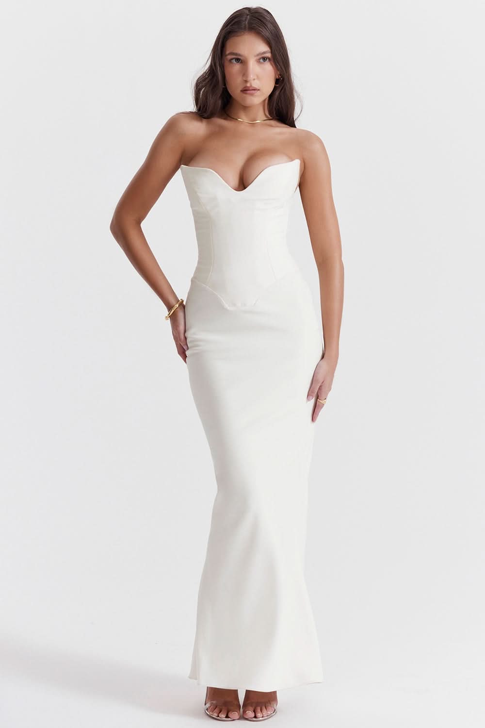 Front view of a white strapless corset maxi dress, highlighting the sweetheart neckline and elegant, fitted design.