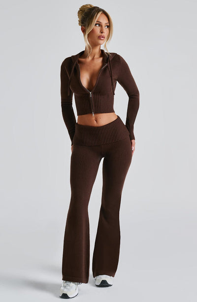 Full body view of a women's brown casual lounge set, including a cropped zip-up hoodie and comfortable flared slacks.