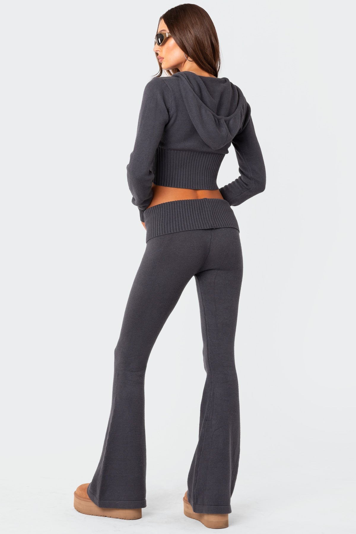 Back view of the charcoal grey casual lounge set, showcasing the cropped hoodie and the fit of the flared slacks.