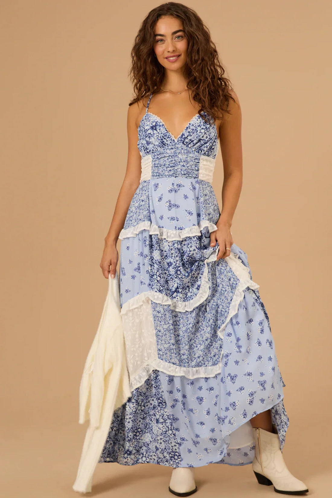 Pink floral print Nola Ruffle Maxi Dress with white lace panels and ruffled tiers, spaghetti straps, and ruched bodice detail.