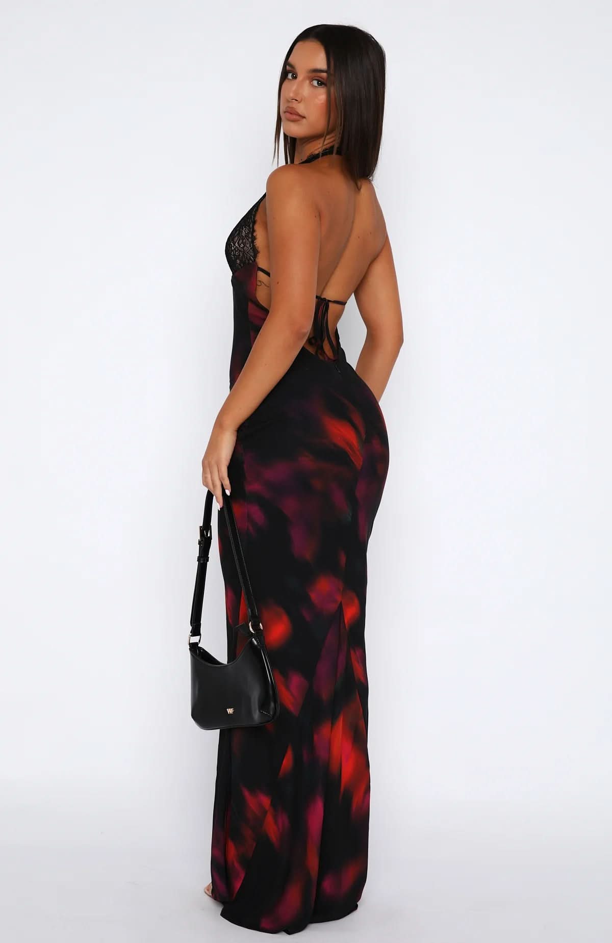 Back view of multi-color maxi dress featuring backless detail and subtle ruching for women