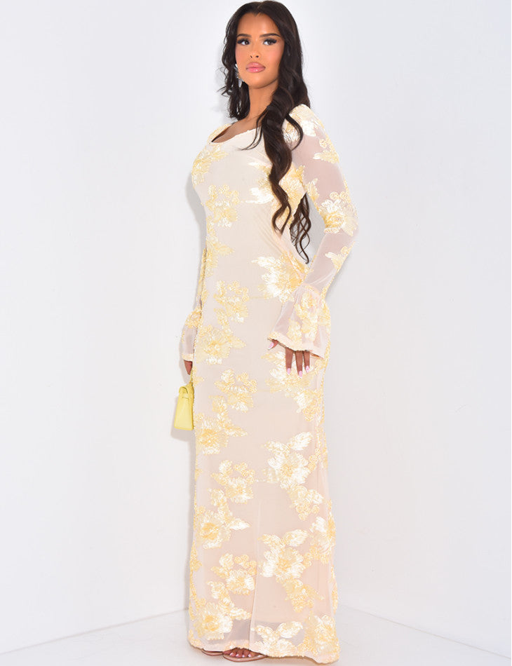 Side view of the cream Norah embroidered maxi dress, displaying the gold floral sequins and the elegant long sheer sleeves.