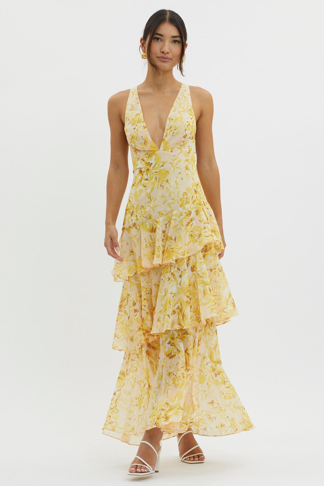 Harriet Ruffle Maxi Dress in vibrant pink and red floral print, featuring a deep V-neck and tiered ruffles.