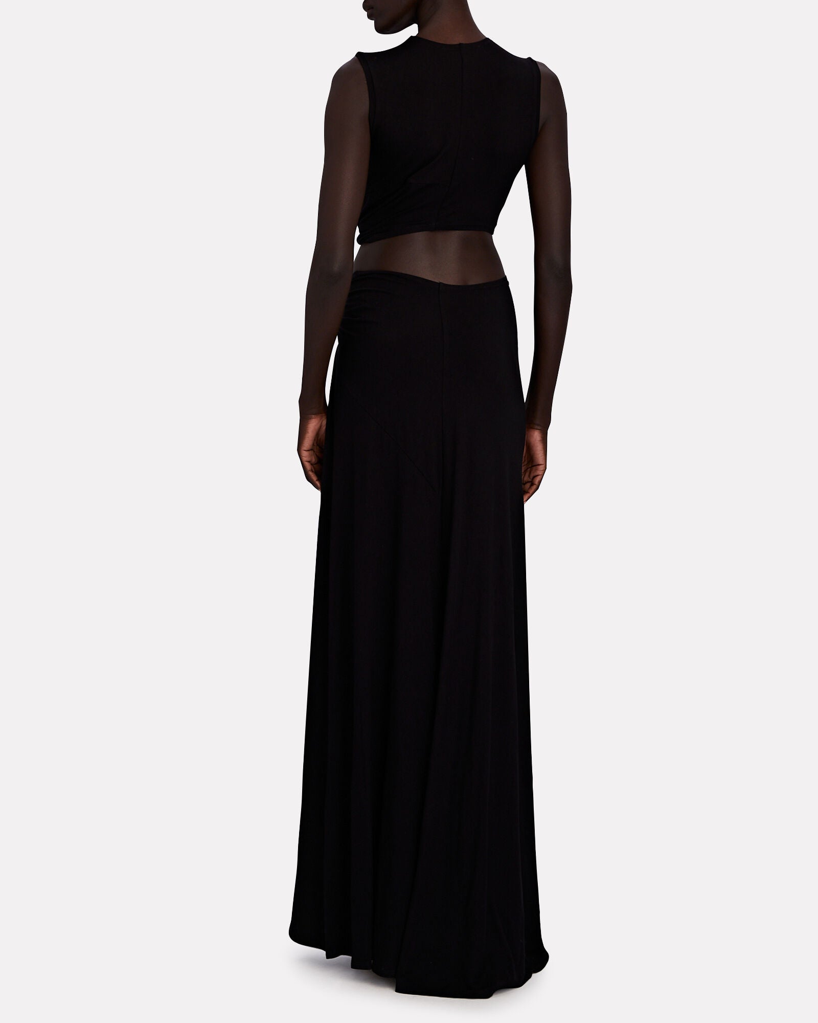 Back view of the black Robyn cutout maxi dress, revealing an open back and flowing skirt.