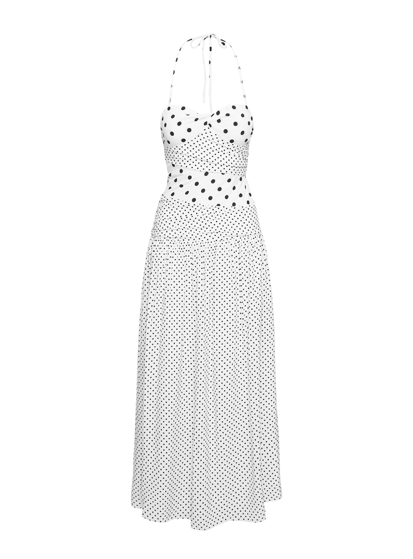 Flat lay of a white polka dot halter maxi dress with a sweetheart neckline and halter ties