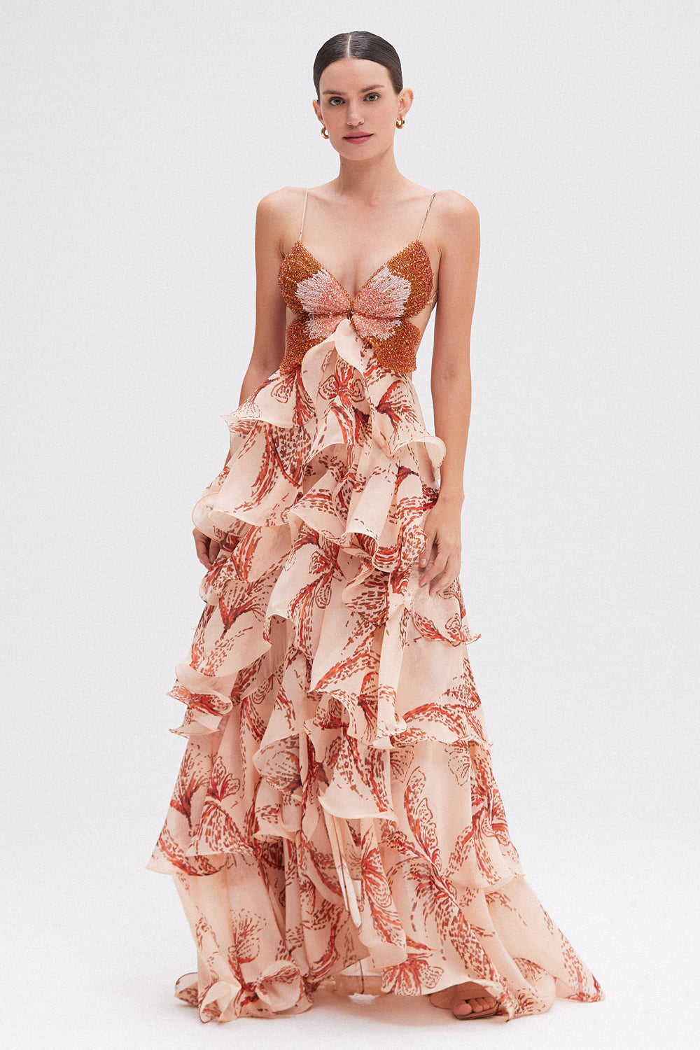 Peach floral maxi dress with butterfly beaded bodice — front view showing layered ruffled skirt and spaghetti straps