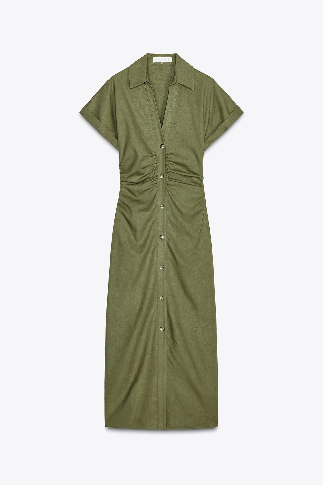 Studio shot of the olive green Sofia button midi dress, featuring a full-button front, collar, and ruched waist detail.